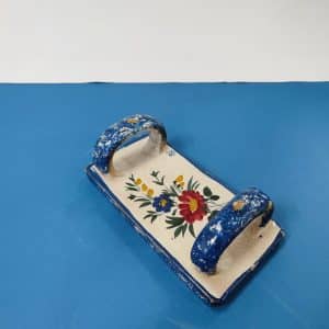 antico schiacciapatate in maiolica